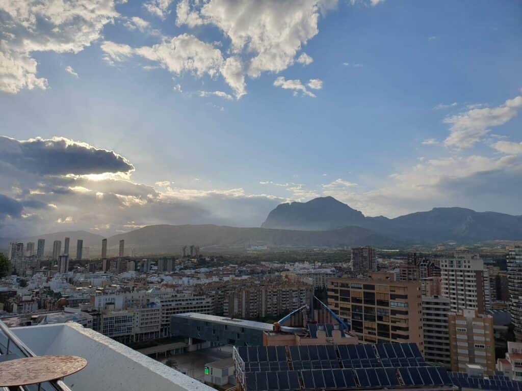 Spanish city skyline with Mountains in the background.